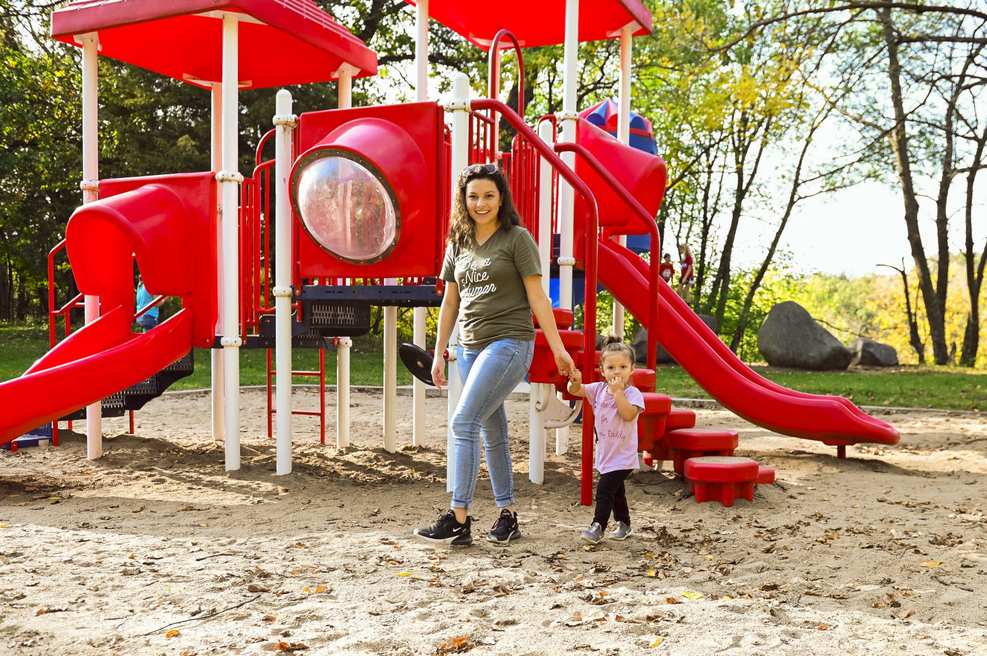 Mom And Daughter On Playground